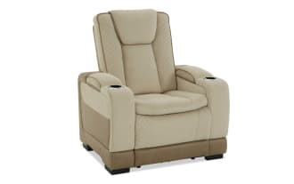 Beige and brown leather recliner chair with quilted side panels, cushioned armrests, and cup holders, designed for living room comfort.