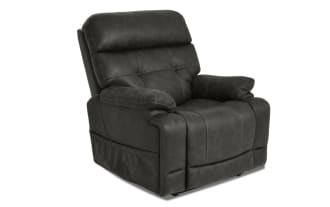 Dark gray plush recliner chair with padded armrests and cushioned backrest, featuring soft upholstery and stitched detailing for living room comfort.