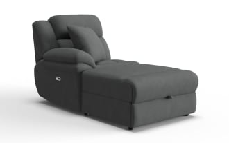 Gray upholstered chaise lounge with a textured fabric, cushioned armrest, backrest, and matching square pillow, ideal for modern living rooms.