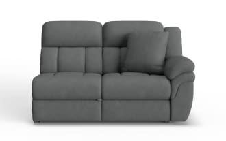 Gray fabric reclining loveseat sofa with padded armrest and back cushions, featuring a matching throw pillow for added comfort.