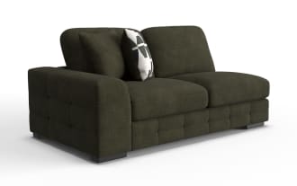 Dark olive green fabric sectional sofa with thick cushions, wide armrest on the left side, and a decorative geometric-patterned throw pillow.
