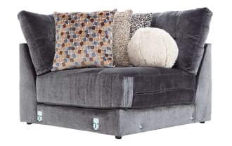 Charcoal gray Jewels Charcoal Corner sectional in glam style, upholstered in soft polyester fabric with plush cushions and decorative accent pillows.