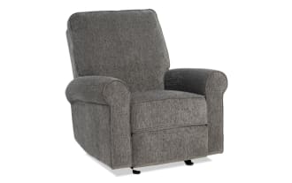 Gray upholstered recliner chair with rounded armrests, cushioned backrest, and fabric texture, designed for comfortable seating.