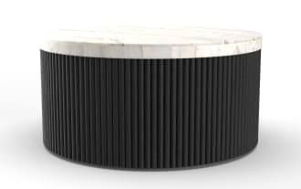 Round coffee table with a white marble top and a black vertically grooved wooden base, modern minimalist design.