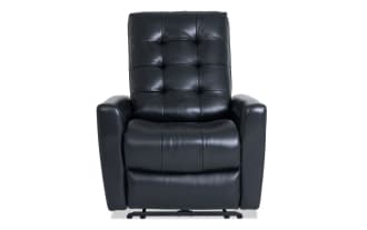 Black leather recliner chair with tufted backrest and padded armrests, designed for comfortable seating and relaxation.