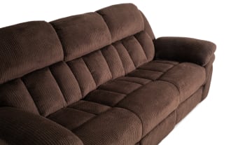Brown plush fabric reclining sofa with padded armrests and segmented cushioned backrest, designed for living room comfort and style.
