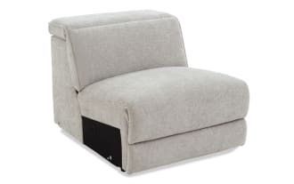 Modern armless accent chair upholstered in light gray textured fabric with a low backrest and cushioned seat, ideal for living room seating.