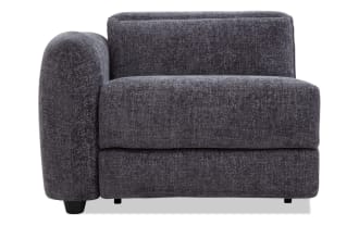 Dark gray upholstered left-arm corner sofa section with plush cushions and textured fabric, ideal for modern living room seating.