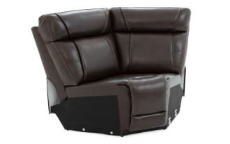 Dark brown leather reclining loveseat with padded headrests, contrast stitching, and black fabric base, designed for comfort and durability.