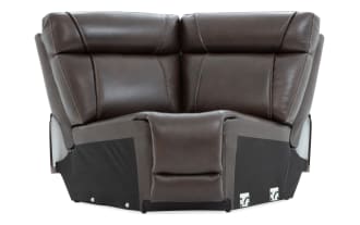 Dark brown leather reclining loveseat with padded headrests, contrast stitching, and black fabric base, designed for comfort and durability.