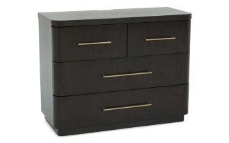 Dark wood dresser with four drawers, featuring sleek rounded corners and long horizontal brass handles, suitable for modern bedroom storage.