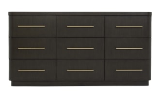 Dark wood dresser with nine drawers, featuring sleek brass handles and rounded edges, suitable for modern bedroom storage.