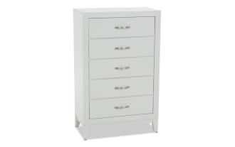 White wooden chest of drawers with five spacious drawers and silver metal handles, featuring a modern minimalist design for bedroom storage.