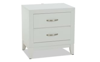 White wooden nightstand with two drawers, brushed metal handles, and a modern, clean-lined design.