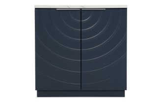 Modern navy blue kitchen base cabinet with textured concentric circle design on doors, white countertop, and silver handle bar.