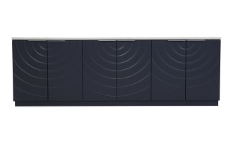 Modern navy blue sideboard cabinet with six doors featuring concentric circle embossed design and sleek silver handles, topped with white marble surface.