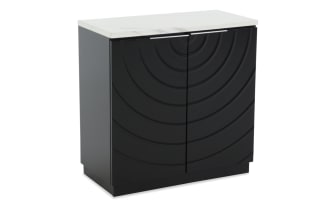 Black kitchen cabinet with a white countertop, featuring two doors with concentric circular embossed patterns and sleek silver handles.