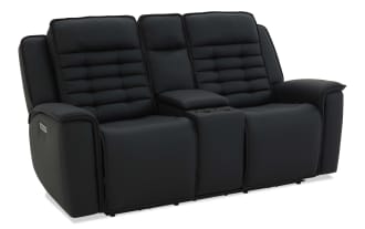Black leather reclining loveseat with padded armrests, segmented cushioned backrests, and a center console, ideal for home theater seating.