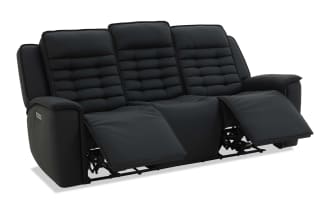 Black three-seater reclining sofa with padded armrests and segmented cushioned backrests, designed for comfort and modern living rooms.