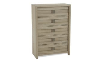 Light wood five-drawer chest with horizontal panel design and metal handles, suitable for bedroom storage and organization.