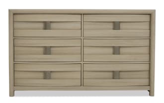 Light wood dresser with six drawers arranged in two columns and three rows, featuring simple rectangular metal handles and a smooth, modern finish.