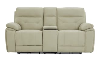 Beige leather reclining loveseat with padded armrests and center console, designed for living room comfort and modern style.