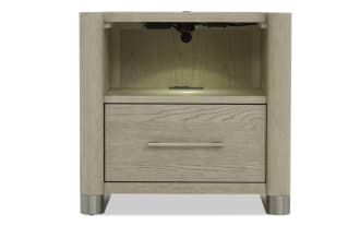 Light wood nightstand with a single drawer, metal handle, open storage space, and metal legs, suitable for bedroom furniture.