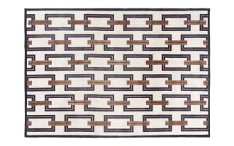 Rectangular area rug with a modern geometric pattern featuring interlocking brown and black rectangular chains on a cream background, suitable for contemporary home decor.