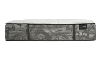 Zeus mattress side view showing gray patterned fabric with black handles and white quilted top, highlighting mattress thickness and design.