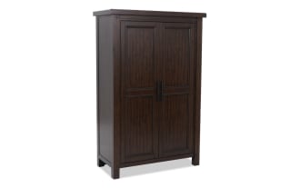 Dark brown wooden wardrobe with two paneled doors and black vertical handles, featuring a classic, sturdy design suitable for bedroom storage.