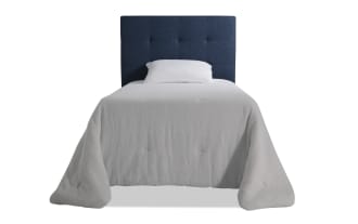 Aiden Full Blue Upholstered Panel Headboard in polyester fabric with tufted transitional design, paired with white bedding for a modern bedroom look.