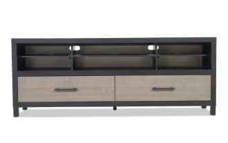 Black and beige wooden TV stand with two drawers, open shelves, cable management holes, and metal handles for media storage.