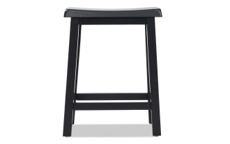 Black wooden stool with a flat, slightly curved seat and four straight legs connected by horizontal supports, suitable for kitchen or bar seating.