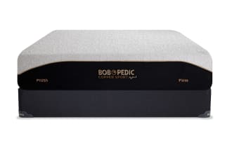 Bob-O-Pedic Copper Sport Hybrid 11.5'' Queen Dual Standard Mattress Set with plush-to-firm dual firmness, white patterned top, black side panel, and temperature-regulating copper-infused memory foam layers.