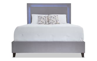Performa Full Gray Upholstered Panel Bed with plush polyester fabric, rubberwood frame, and LED-lit contemporary headboard for modern bedrooms.