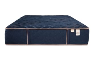 Copper Radiance 13'' Full Extra Firm Mattress in navy blue with quilted copper-infused cover, gel-infused layers, and wrapped coils for firm support.