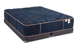 Copper Radiance 13'' King Extra Firm Split Low Profile Mattress Set in navy blue with quilted copper-infused cover, gel-infused layers, and memory foam foundation by Bob-O-Pedic.