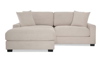 Aspen Beige 86'' Left Arm Facing Chofa in transitional style with plush beige polyester fabric, memory foam cushions, and included accent pillows.