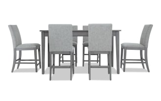 Homeworks 7 Piece Gray Upholstered Counter Height Dining Set with lift-top storage table, six gray fabric stools, transitional style, melamine and rubberwood frame.