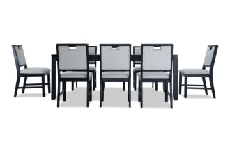 Brookline 9 Piece Black & White Upholstered Dining Set with 6 white polyester fabric chairs and black wood table, transitional style, solid acacia and oak veneers, 18" extendable leaf.