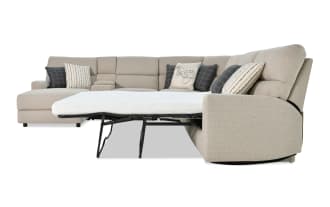 Modern Farmhouse Beige 165" 6-piece left arm facing power reclining sleeper chaise sectional in beige polyester fabric with power headrest, gel mattress, and accent pillows.