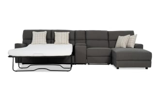 Modern Farmhouse gray 4-piece right arm facing power reclining sleeper chaise sectional with full gel mattress, power headrest, polyester fabric upholstery, and accent pillows.