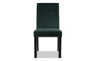 Dark green velvet upholstered dining chair with high backrest, silver nailhead trim, and dark wooden legs, modern style.