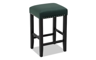 Bar stool with dark wooden legs and teal upholstered seat featuring silver nailhead trim, suitable for kitchen or bar seating.
