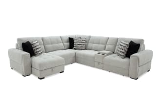 Slider Bob Gray 131'' power sliding 6-piece left arm facing chaise sectional in gray polyester fabric. Transitional style with plush cushions, accent pillows, and USB/USB-C ports.