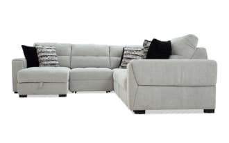 Slider Bob Gray 118'' power sliding 5-piece left arm facing chaise sectional in gray polyester fabric. Transitional style with plush cushions, accent pillows, and USB/USB-C ports for charging.