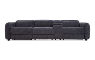Dark gray fabric sectional sofa with wide armrests, plush cushions, and a built-in center console for storage and cup holders, ideal for modern living rooms.