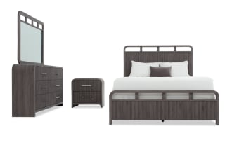 Modern bedroom set featuring a dark gray wood finish with a bed, two-drawer nightstand, and six-drawer dresser with mirror, showcasing a sleek, contemporary style.