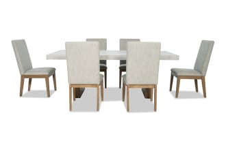 Monterey 7 Piece Dining Set with gray fabric polyester upholstered solid back chairs and faux concrete melamine tabletop in traditional style.