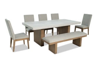 Monterey 7 Piece Natural & Gray Solid Back Upholstered Dining Set with Bench, traditional style with gray polyester fabric, faux concrete melamine table top, rubberwood and hardwood solids frame, includes five memory foam chairs and matching bench.
